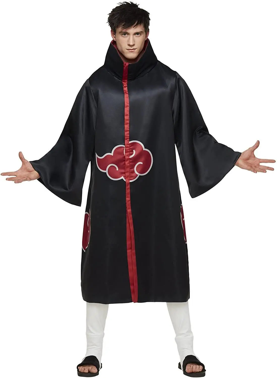 A person stands with arms outstretched in a NorthAmericaTesting Akatsuki Robe with red clouds, white pants, and open-toed black sandals—a striking Naruto cosplay look.